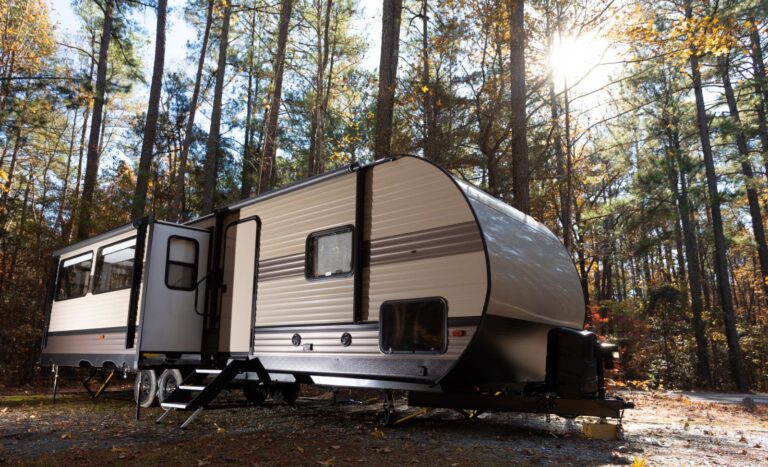 Travel trailer set up on a full hookup RV site