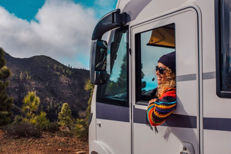 Smiling driver arriving in her motorhome